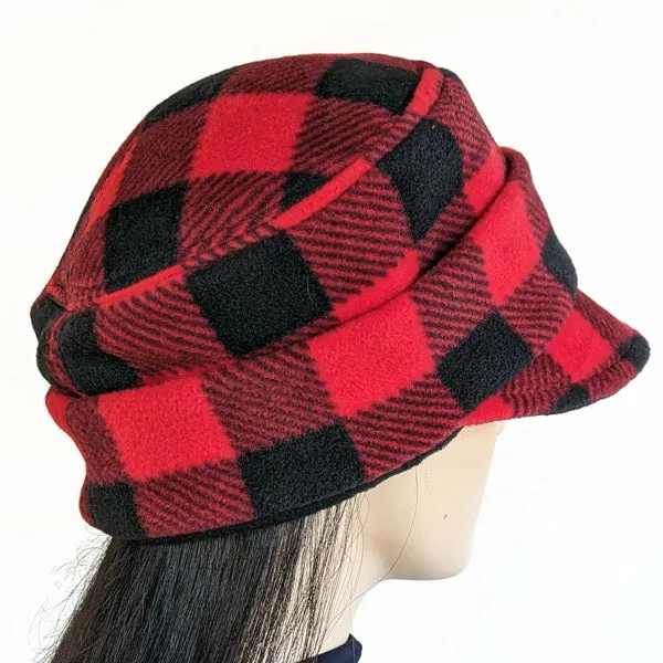 Fleece Fashion Cap with floral pin in popular plaid check, with fleece cuff and pin